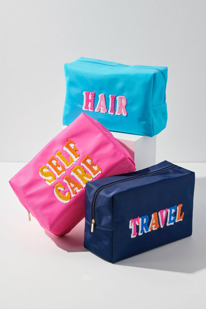 "HAIR" OVERSIZED ZIP POUCH
