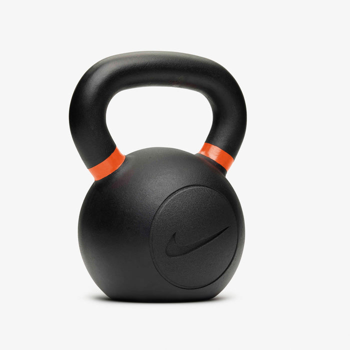 A black Nike kettlebell with a green handle wrap and debossed branding on the surface.