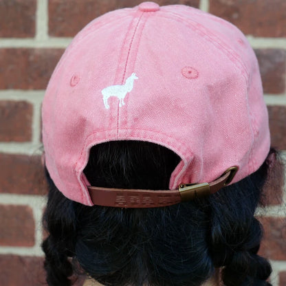 Image of back of coral dad hat with embroidered llama